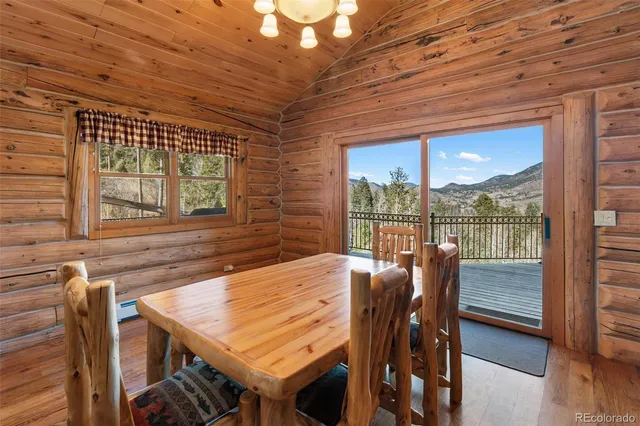 a kitchen with stainless steel appliances granite countertop a stove and a refrigerator