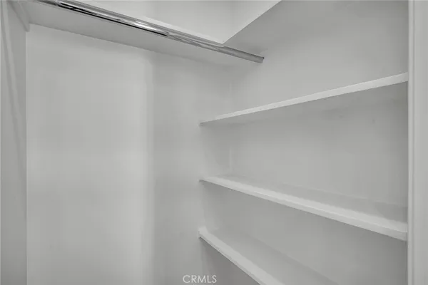 a view of an empty walk in closet