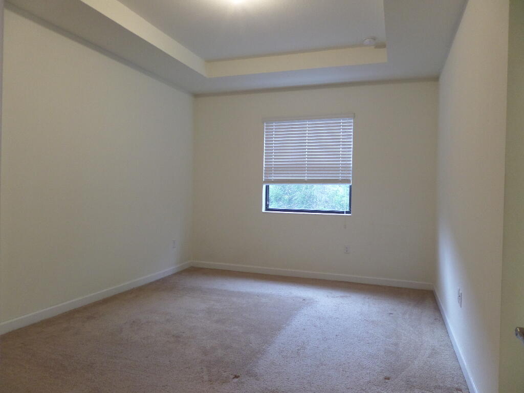9328 West 33rd Way Hialeah, FL 33018 - Photo 11 of 24 an empty room with a window