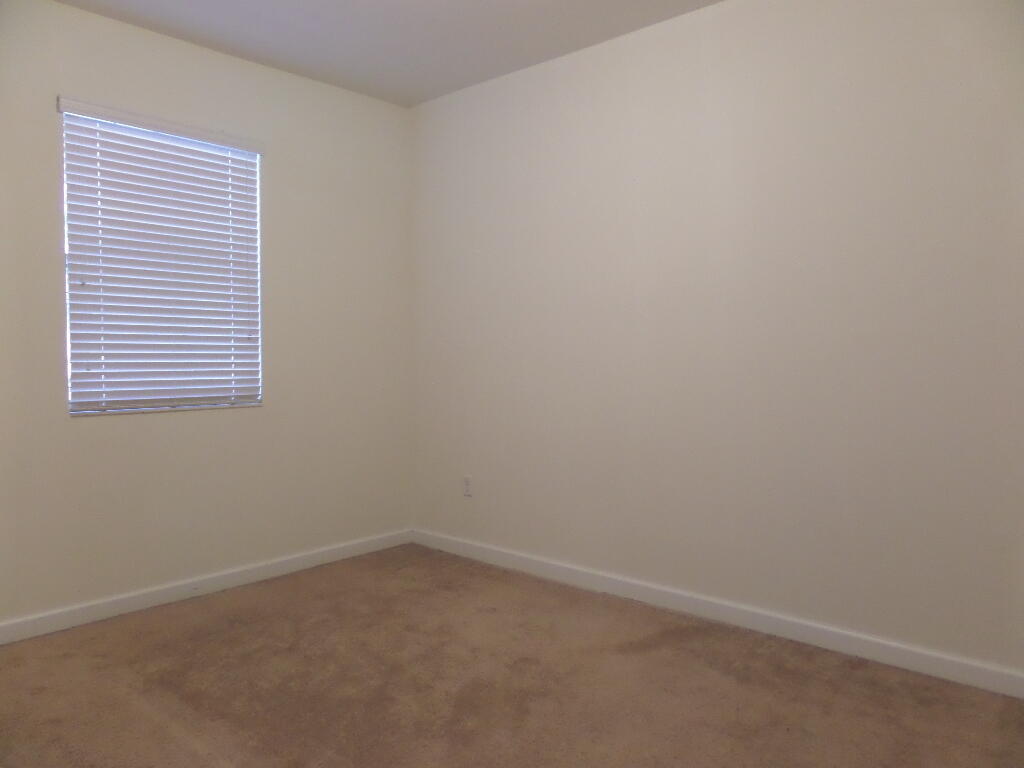9328 West 33rd Way Hialeah, FL 33018 - Photo 15 of 24 an empty room with a window
