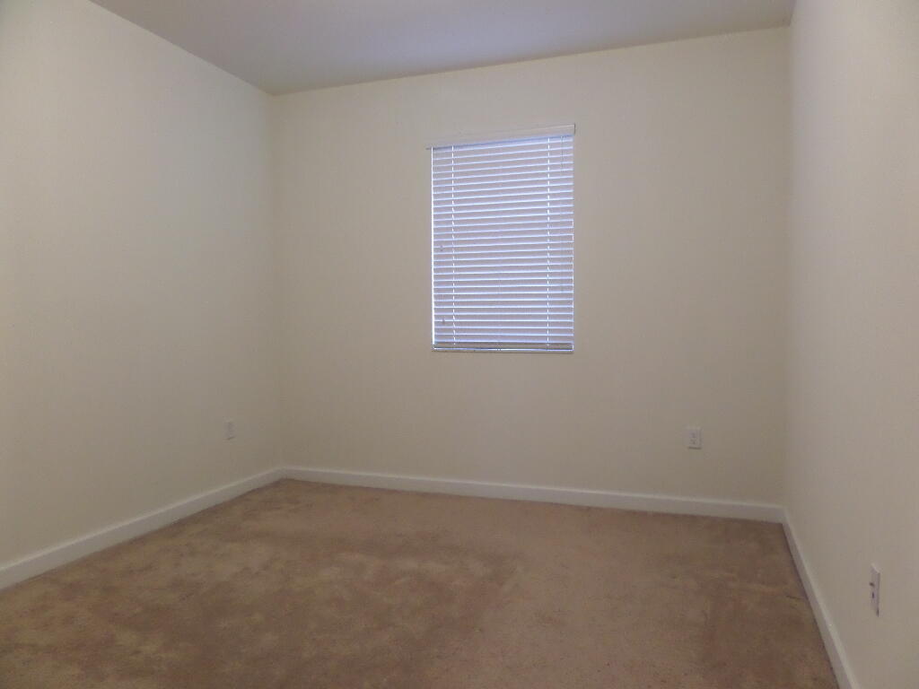 9328 West 33rd Way Hialeah, FL 33018 - Photo 16 of 24 an empty room with a window