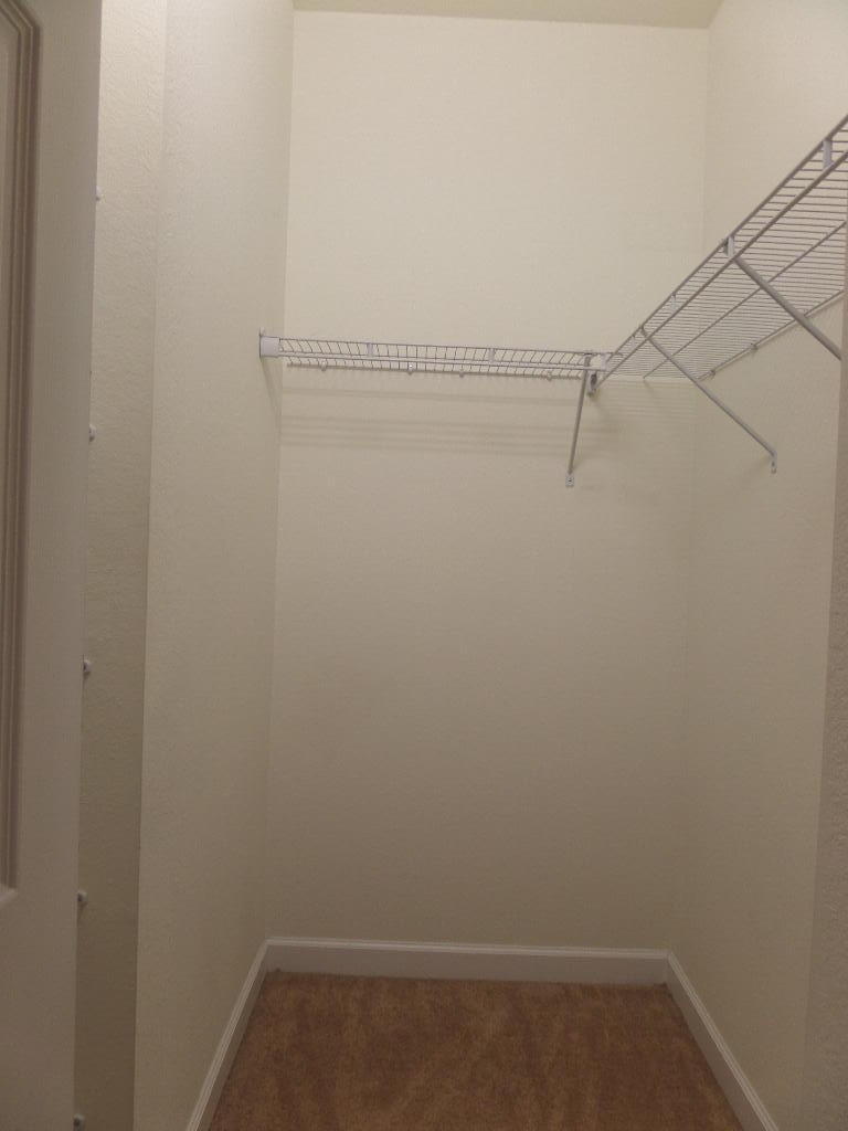 9328 West 33rd Way Hialeah, FL 33018 - Photo 17 of 24 a view of a room with racks on the wall