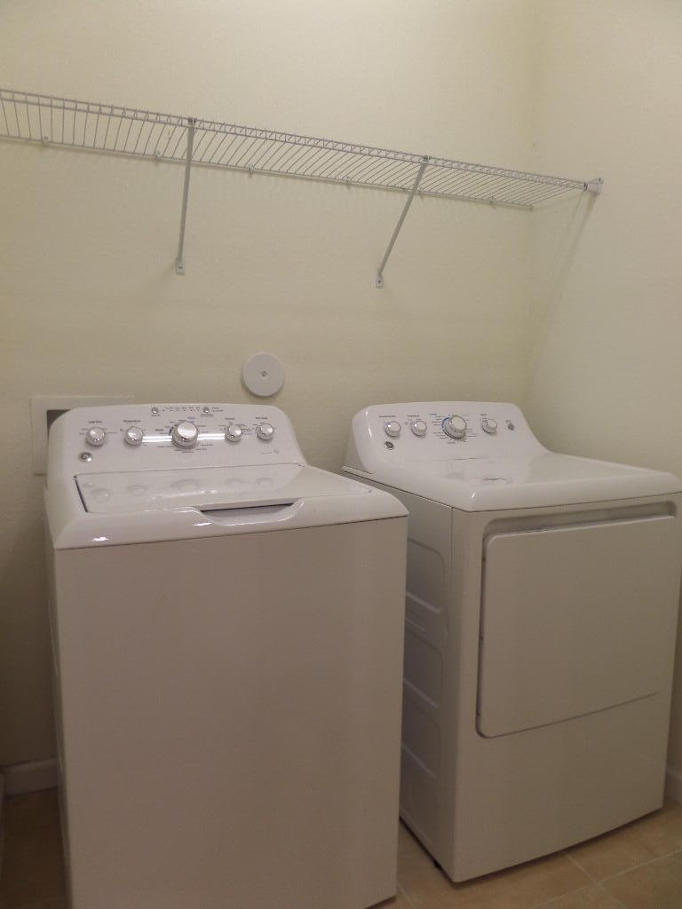 9328 West 33rd Way Hialeah, FL 33018 - Photo 19 of 24 a utility room with dryer and washer