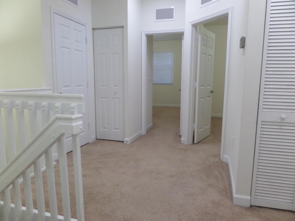9328 West 33rd Way Hialeah, FL 33018 - Photo 10 of 24 a view of hallway with closet