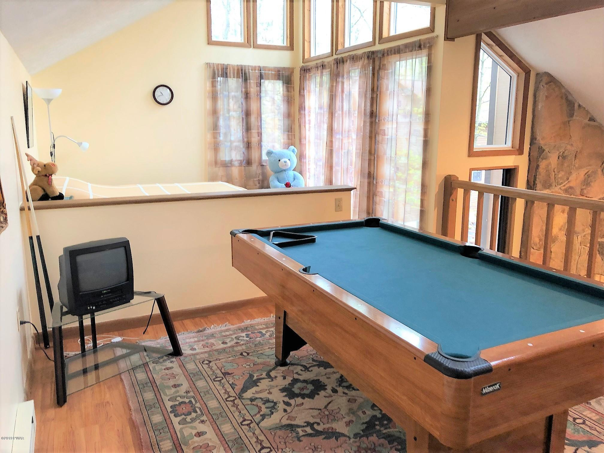 3039 Northgate Road Lake Ariel, PA 18436 - Photo 25 of 57 a room with furniture and a window