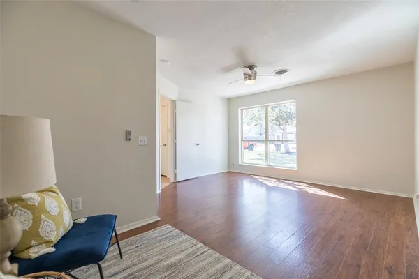 a living room with furniture and window