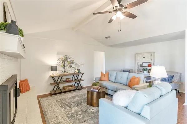 a kitchen with a sink stove top oven and cabinets