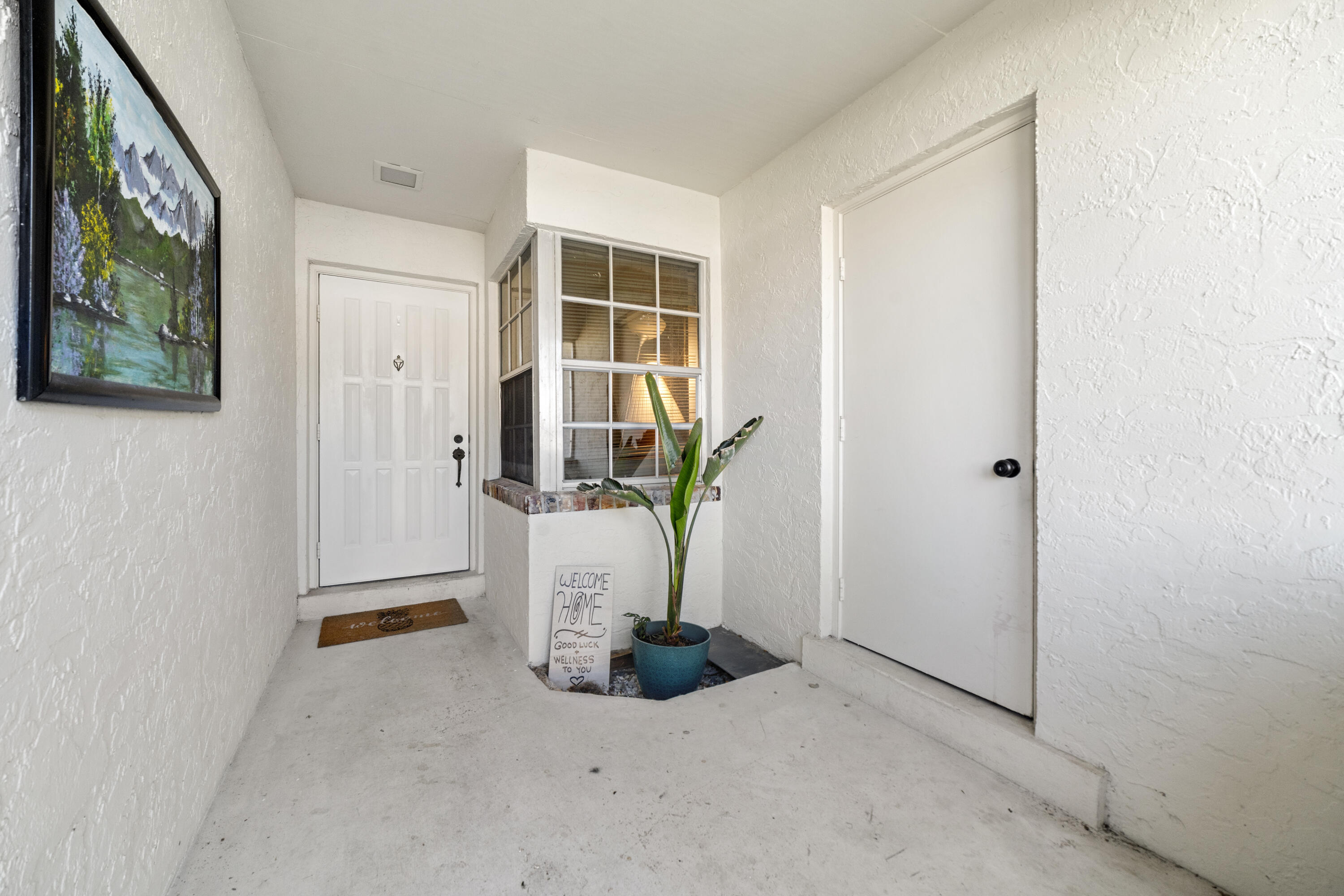 197 Bent Arrow Drive Jupiter, FL 33458 - Photo 3 of 33 a view of livingroom with furniture and window