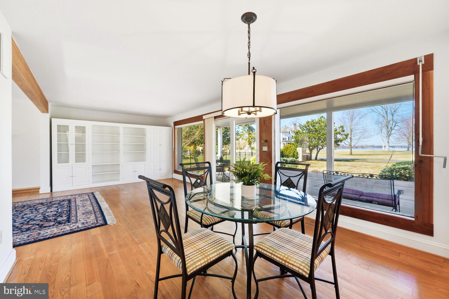 7 Hatsawap Road Cambridge, MD 21613 - Photo 18 of 62 Dining room overlooking rear yard and river