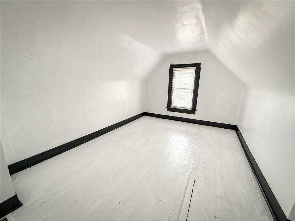 548 West Brady Street Butler, PA 16001 - Photo 16 of 36 an empty room with a window