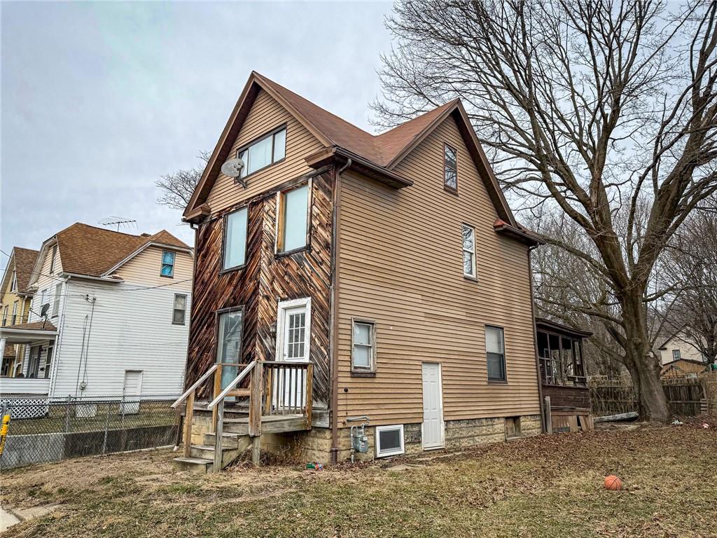 548 West Brady Street Butler, PA 16001 - Photo 2 of 36 a view of a house with a yard and large tree