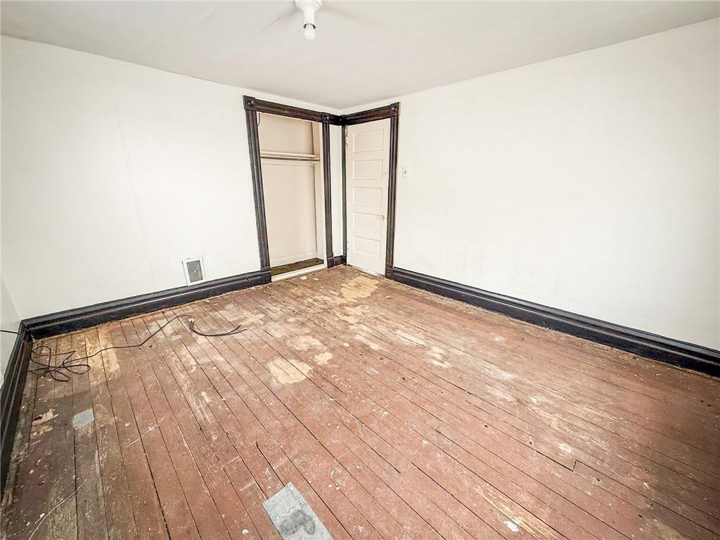 548 West Brady Street Butler, PA 16001 - Photo 23 of 36 a view of empty room with wooden floor and fan