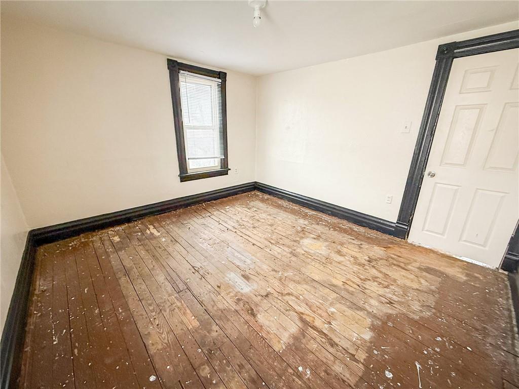 548 West Brady Street Butler, PA 16001 - Photo 28 of 36 a view of an empty room with a window