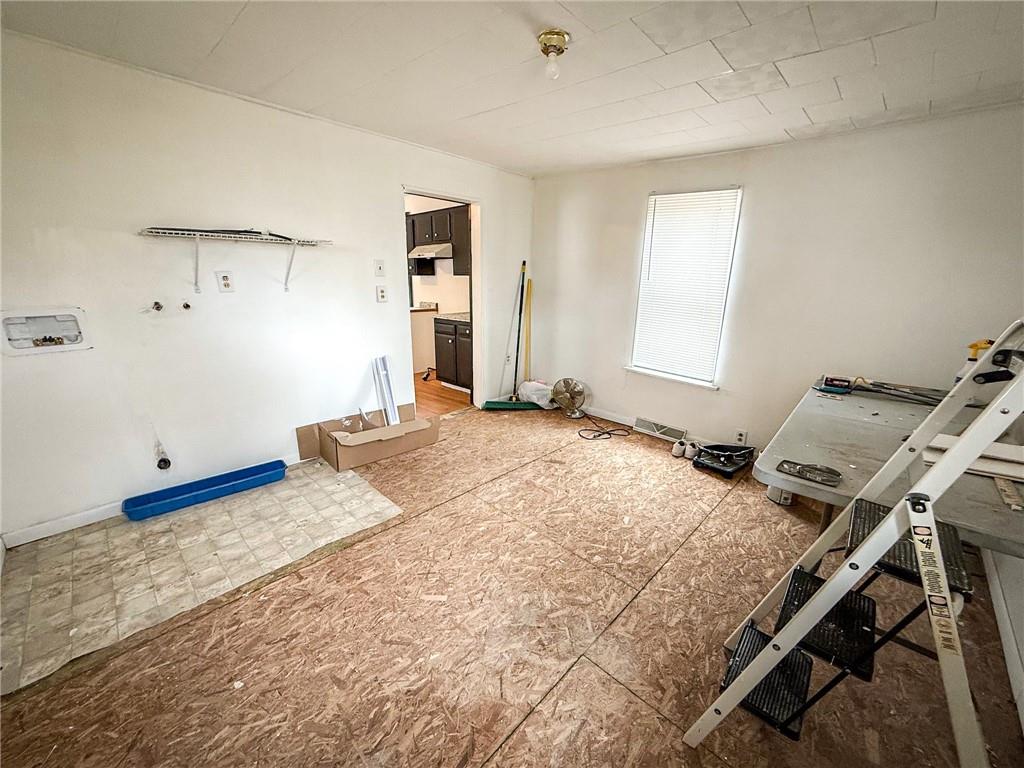 548 West Brady Street Butler, PA 16001 - Photo 33 of 36 a bedroom with a bed and a window