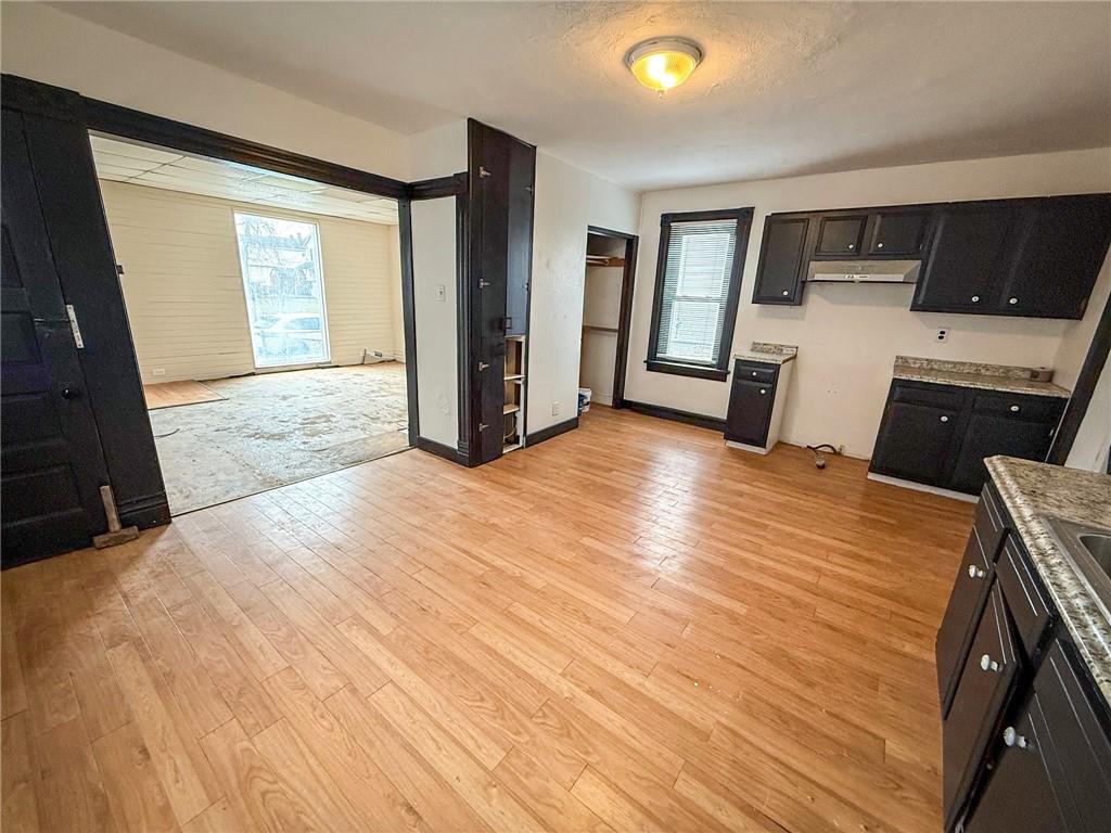 548 West Brady Street Butler, PA 16001 - Photo 8 of 36 a view of livingroom with hardwood floor and a ceiling fan