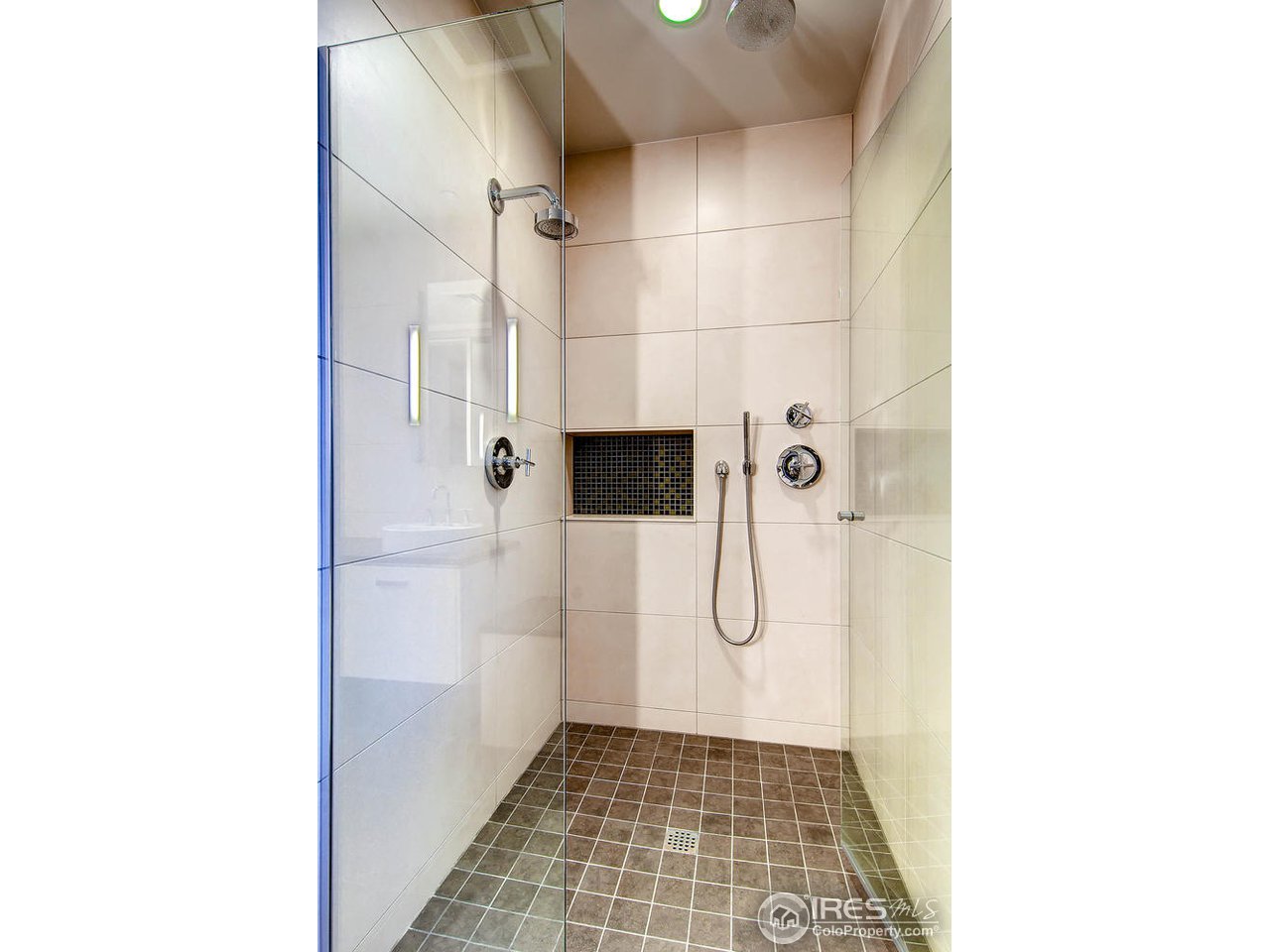 1701 15th Street, Unit 302 Boulder, CO 80302 - Photo 15 of 25 a bathroom with a shower