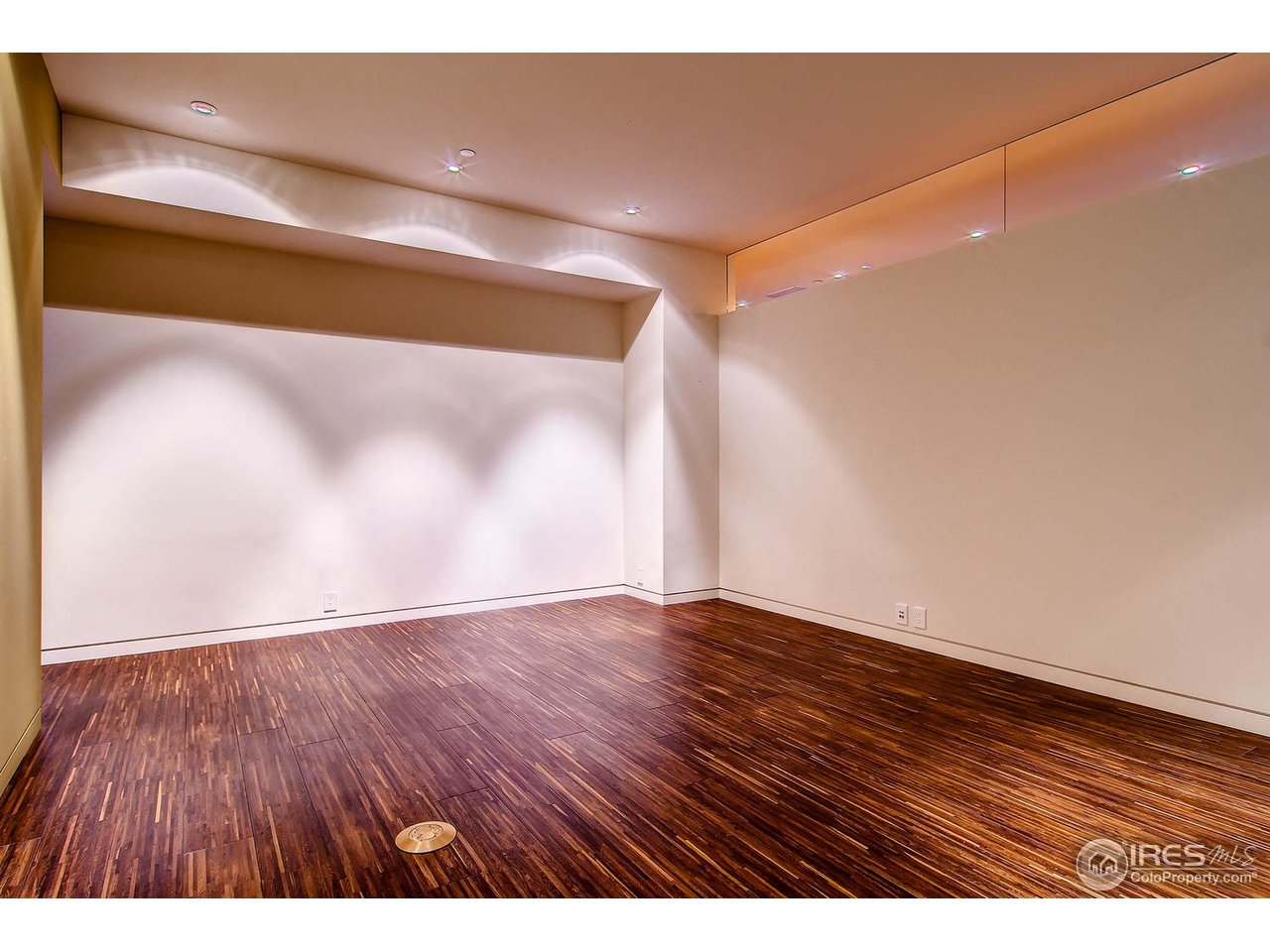 1701 15th Street, Unit 302 Boulder, CO 80302 - Photo 16 of 25 a view of an empty room with wooden floor
