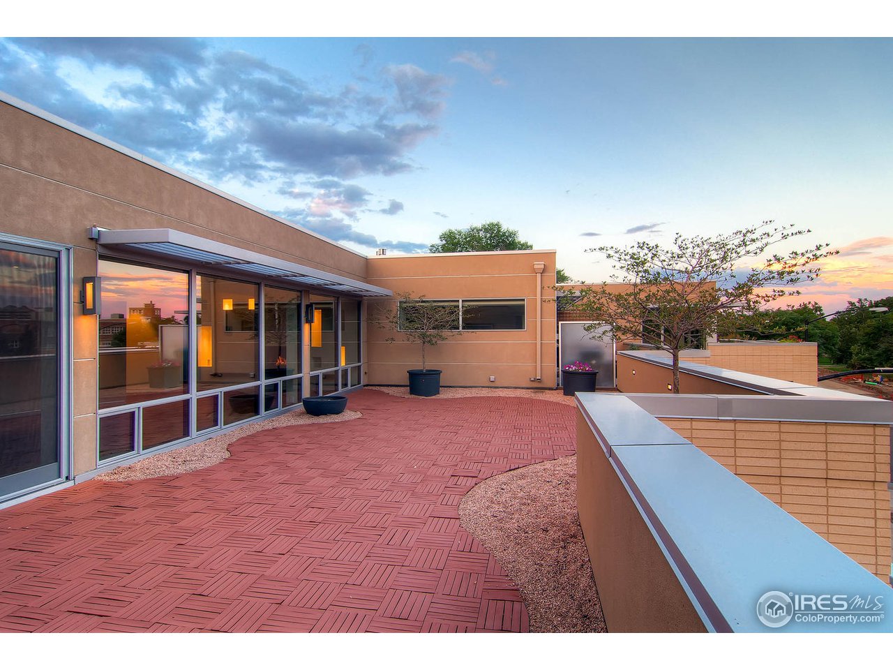 1701 15th Street, Unit 302 Boulder, CO 80302 - Photo 2 of 25 a swimming pool with outdoor seating and yard