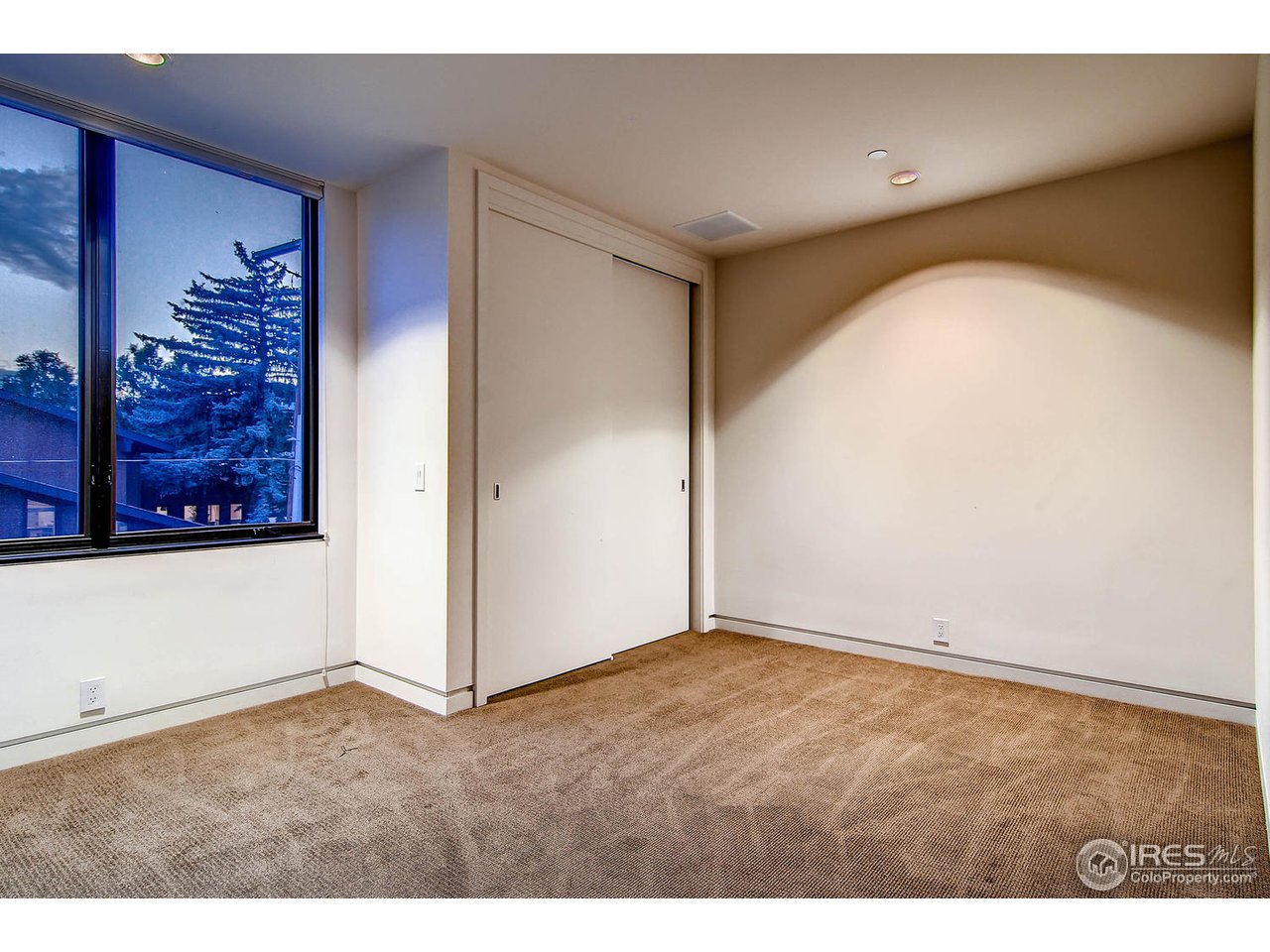 1701 15th Street, Unit 302 Boulder, CO 80302 - Photo 22 of 25 a view of an empty room and window