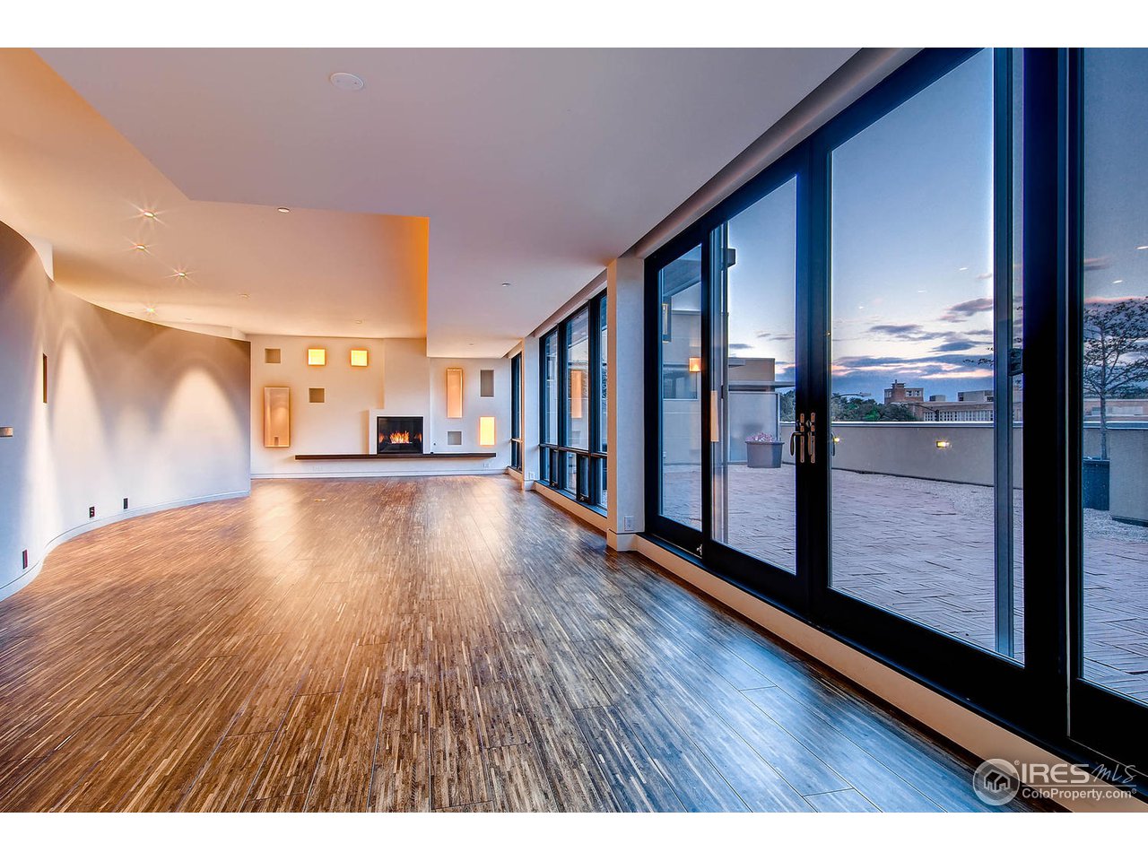 1701 15th Street, Unit 302 Boulder, CO 80302 - Photo 7 of 25 a view of an empty room and wooden floor