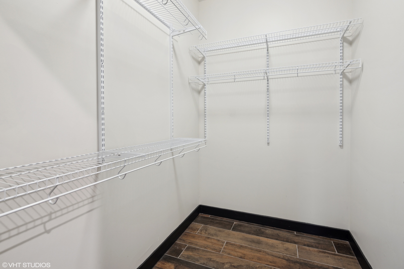 171 North Aberdeen Street, Unit 706 Chicago, IL 60607 - Photo 11 of 20 a view of a room with racks on the wall