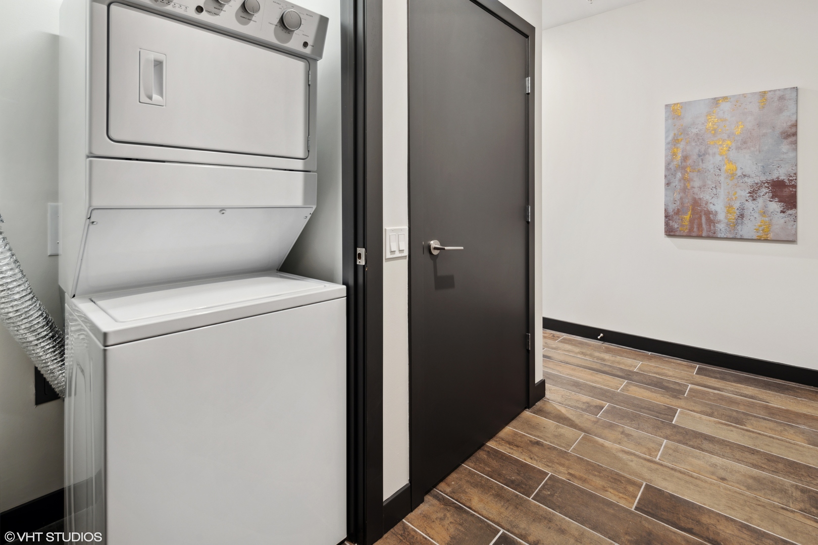 171 North Aberdeen Street, Unit 706 Chicago, IL 60607 - Photo 16 of 20 a utility room with dryer and washer