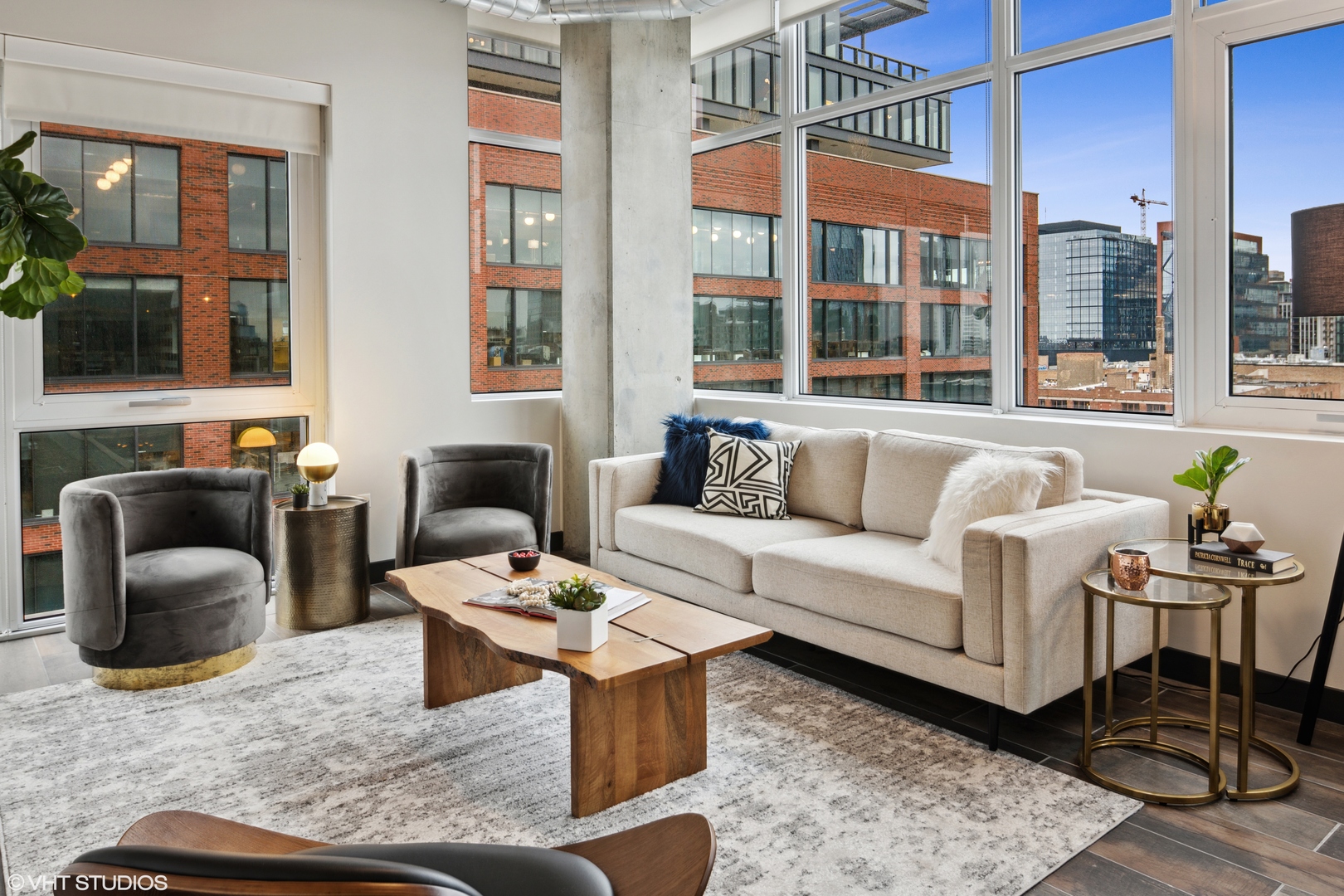 171 North Aberdeen Street, Unit 706 Chicago, IL 60607 - Photo 2 of 20 a living room with furniture and a large window