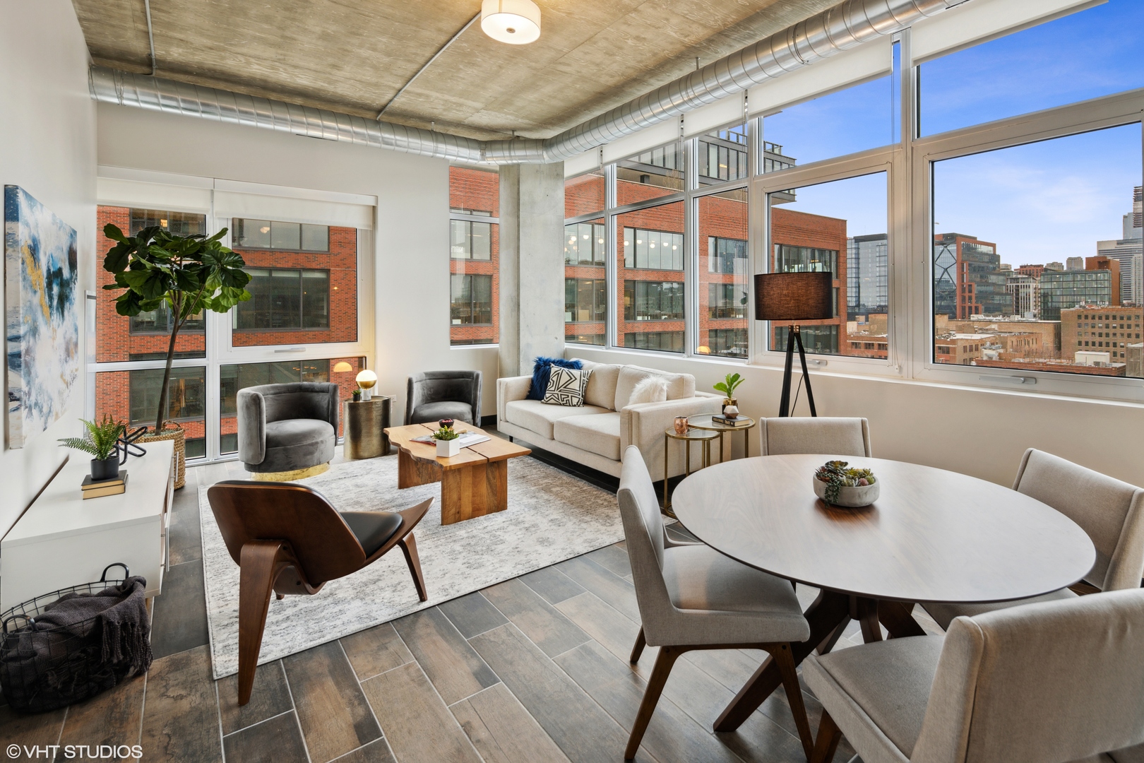 171 North Aberdeen Street, Unit 706 Chicago, IL 60607 - Photo 4 of 20 a living room with furniture and a floor to ceiling window