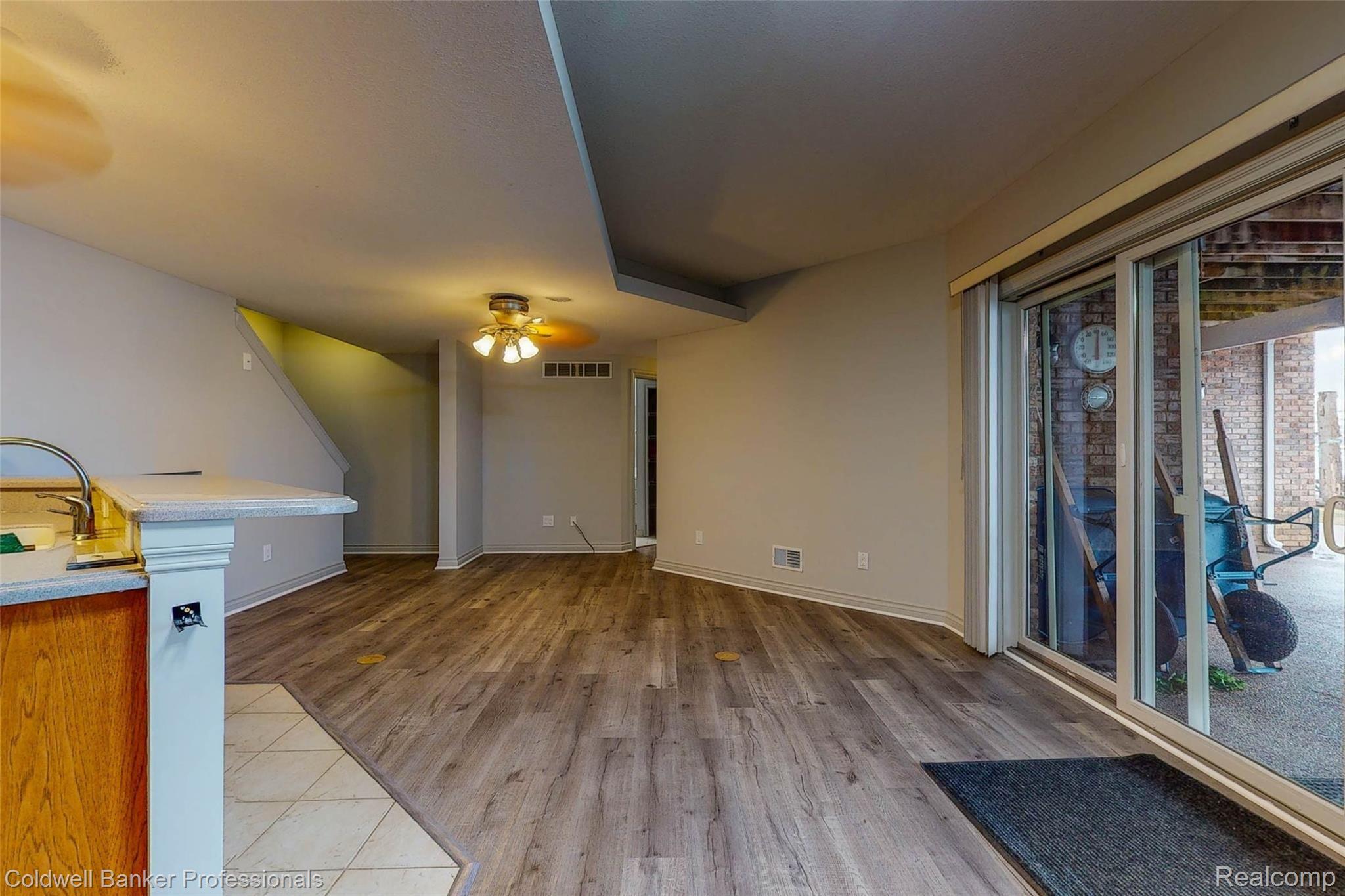 6576 Bennett Lake Road Fenton, MI 48430 - Photo 20 of 46 Lower level Living room