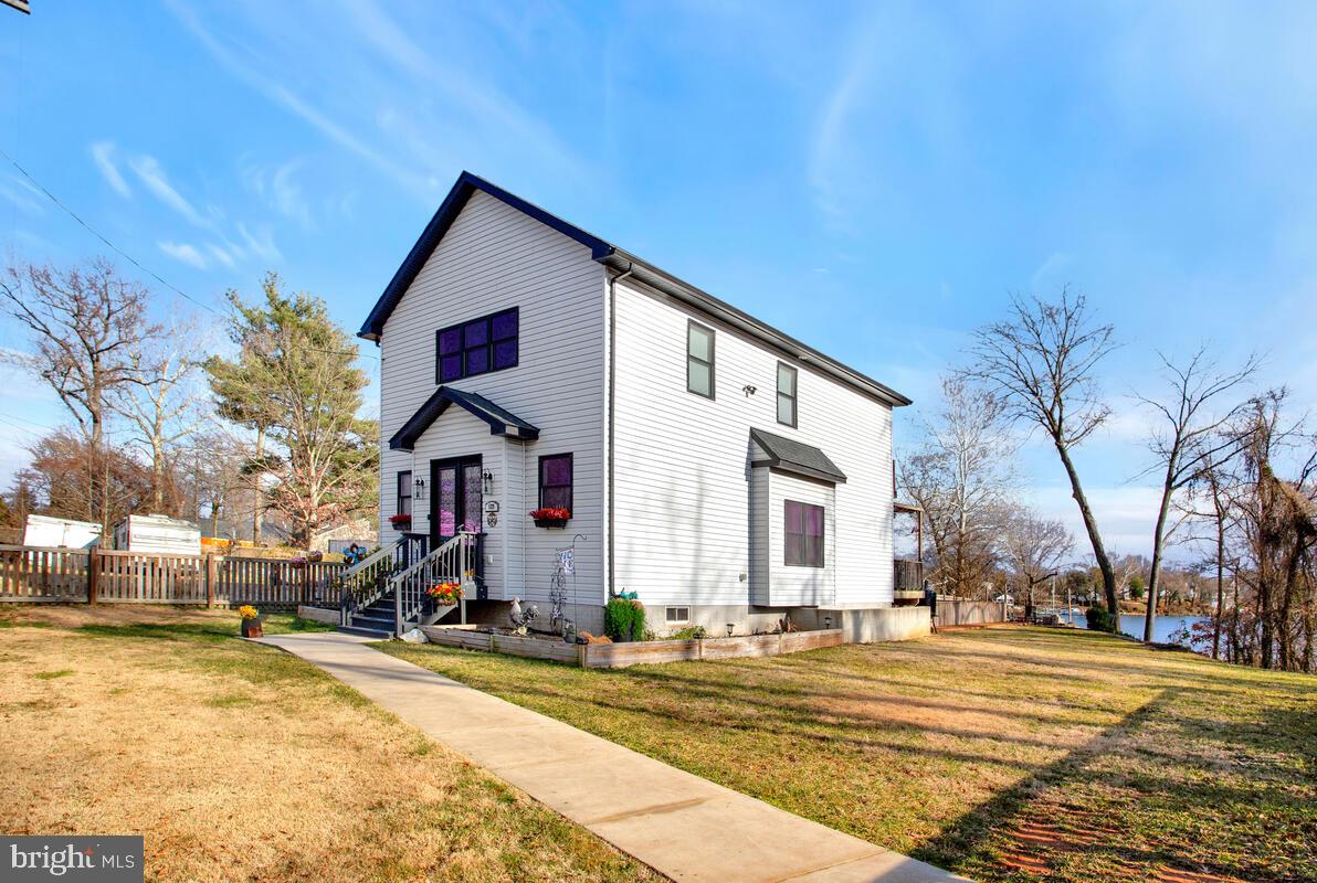 129 Carvel Beach Road Carvel Beach, MD 21226 - Photo 53 of 56 a view of a house with snow on the road