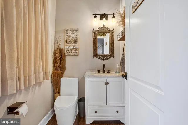 a kitchen with stainless steel appliances granite countertop a stove and a refrigerator