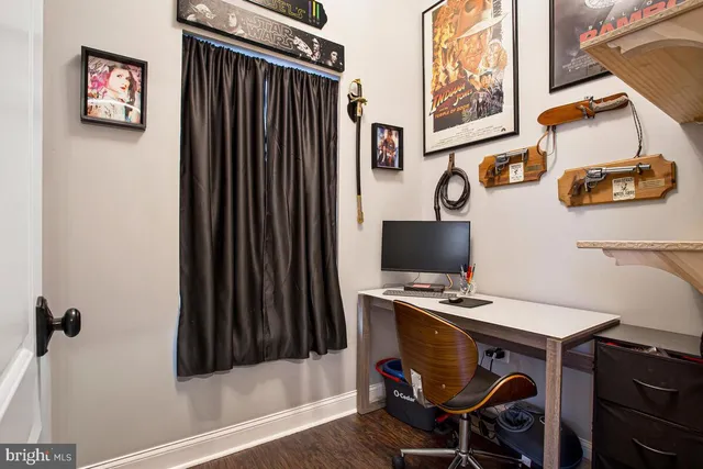 a view of entryway with wooden floor