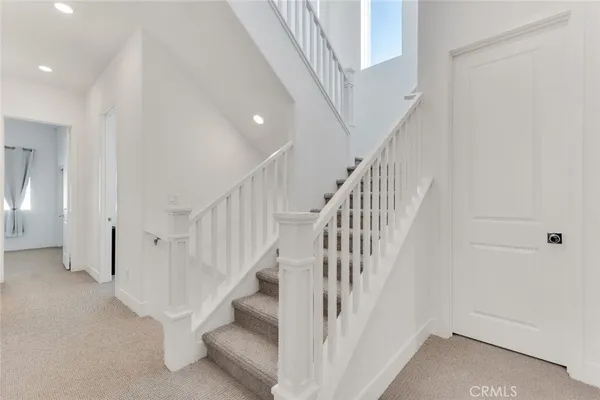 a view of a livingroom with a staircase