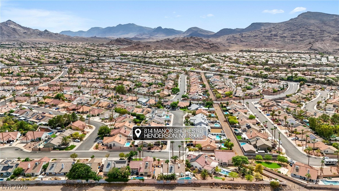 814 Manor Shores Road Henderson, NV 89002 - Photo 34 of 40 Dramatic mountain vistas rise behind this peaceful suburban neighborhood.
