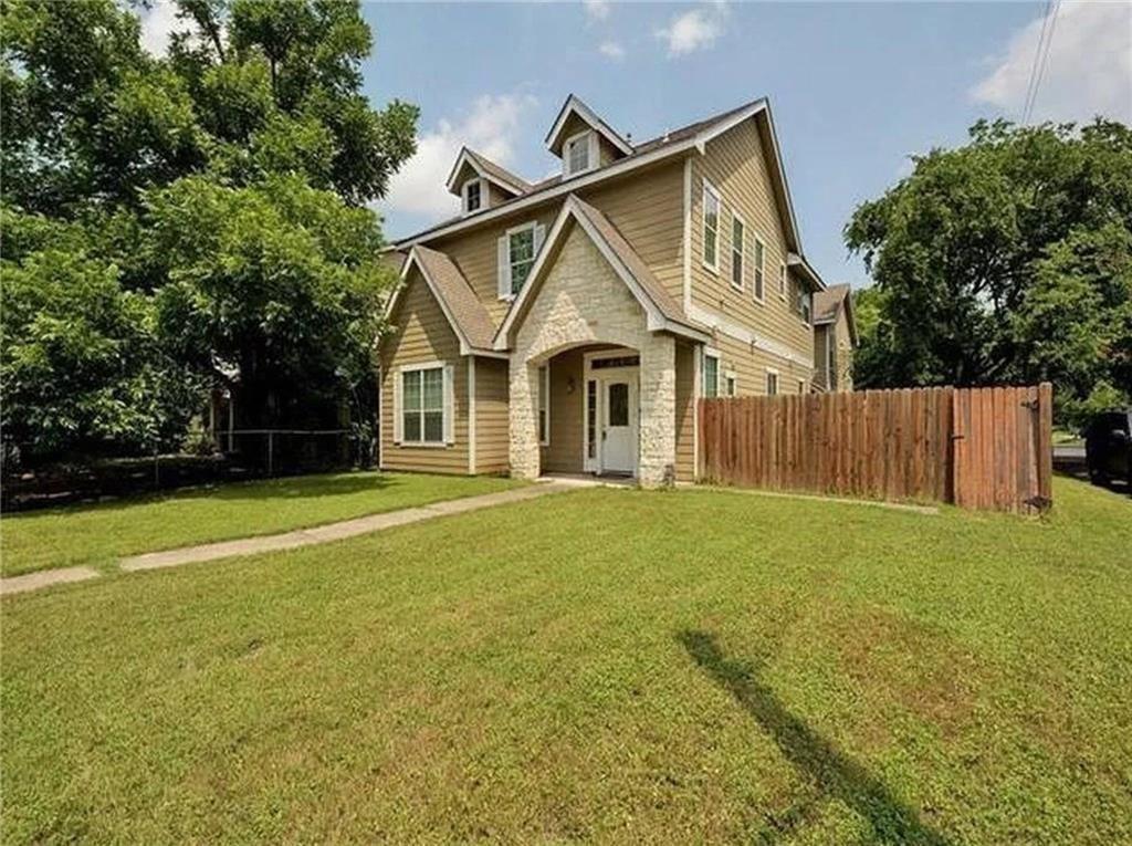 5501 Duval Street, Unit A Austin, TX 78751 - Photo 2 of 23 a front view of a house with yard and tree