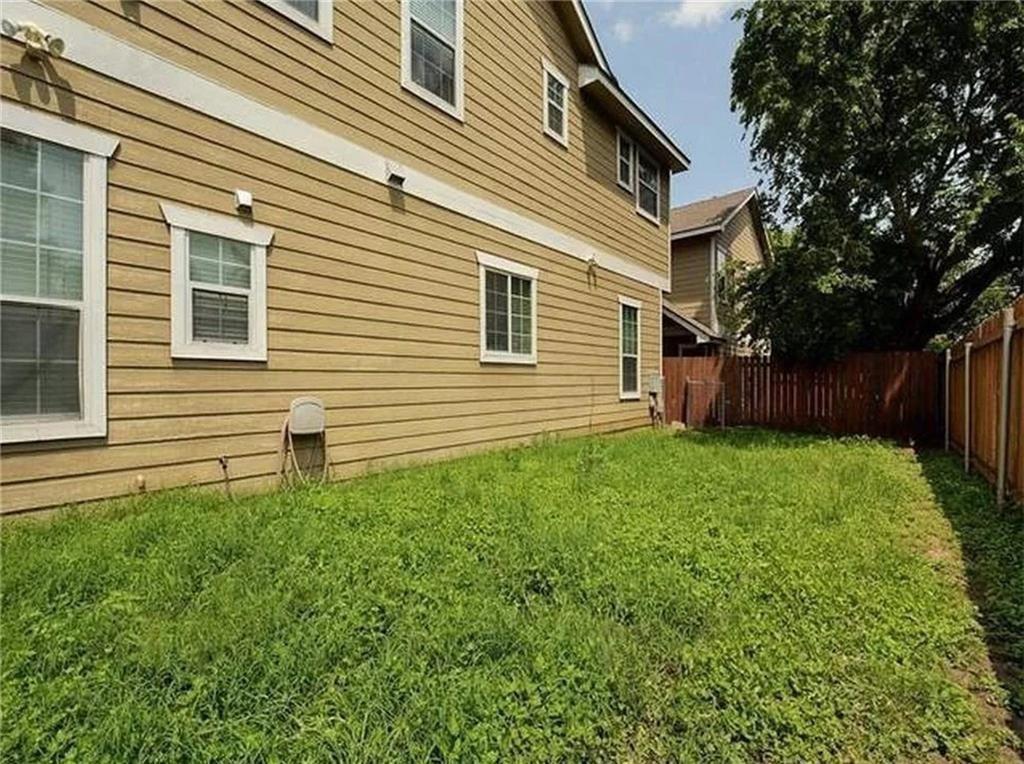5501 Duval Street, Unit A Austin, TX 78751 - Photo 21 of 23 a front view of house with a garden