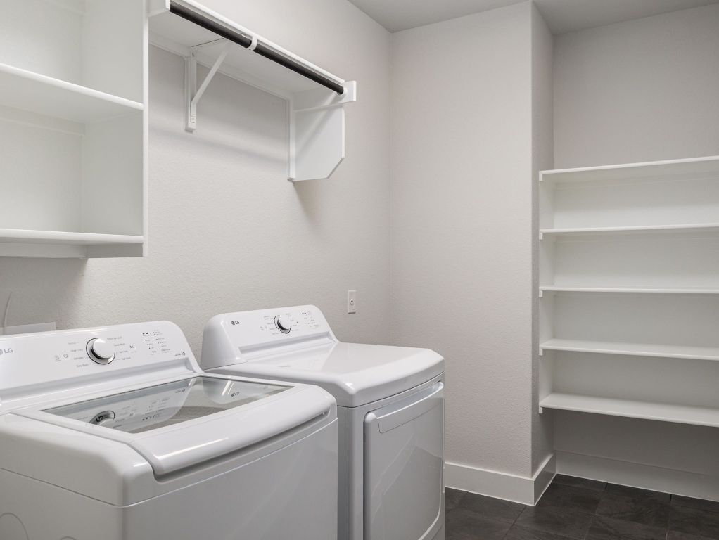 416 Ridgewell Loop Georgetown, TX 78633 - Photo 16 of 19 a utility room with dryer and washer