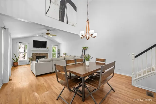 a view of a livingroom with furniture and a flat screen tv