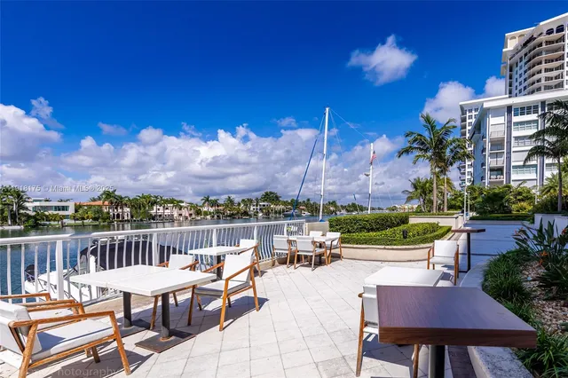 a view of a terrace with furniture