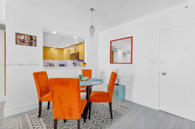a view of a dining room with furniture