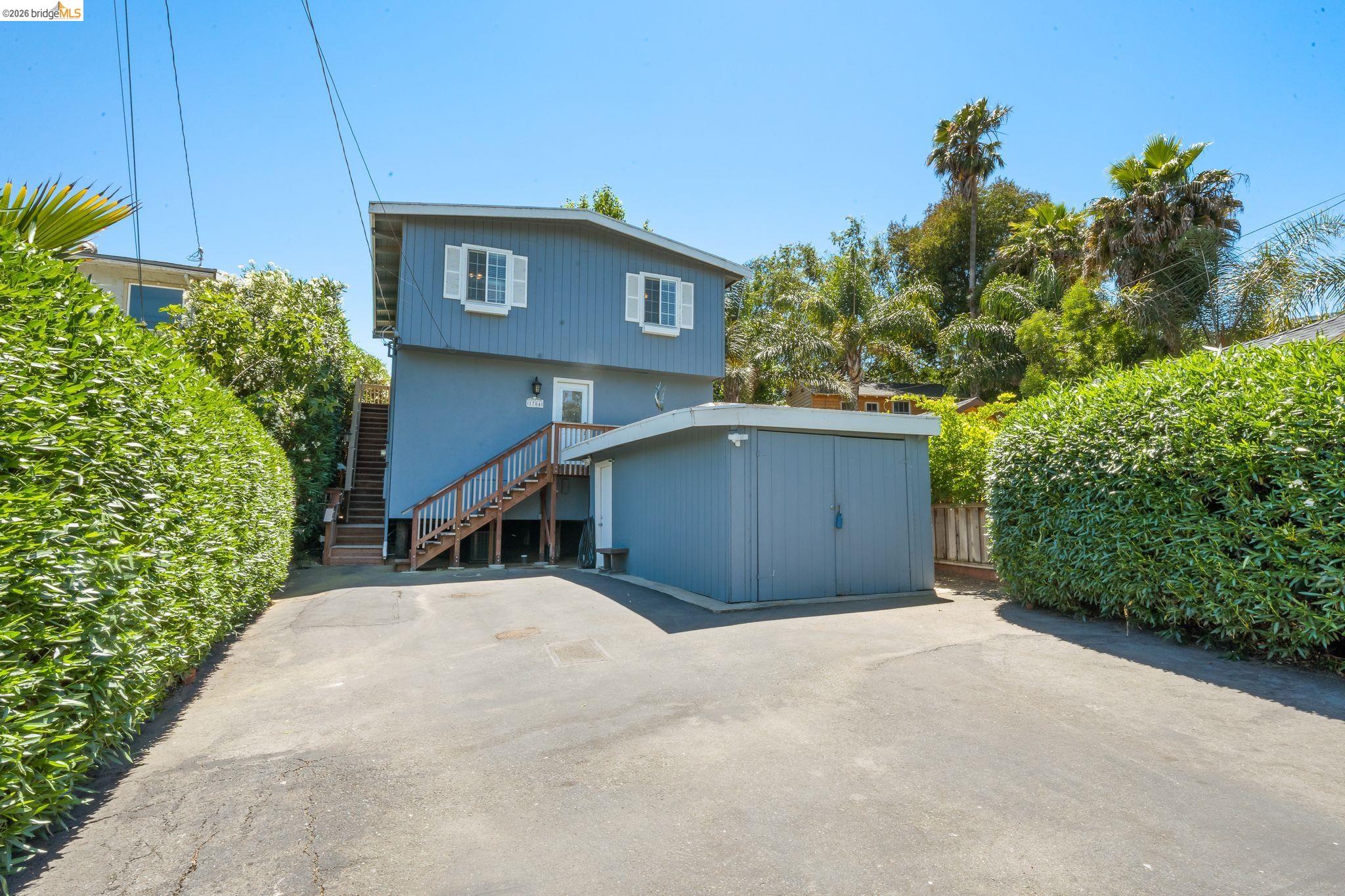 1704 Taylor Road Bethel Island, CA 94511 - Photo 6 of 73 Two-story property featuring a blue exterior with white window shutters