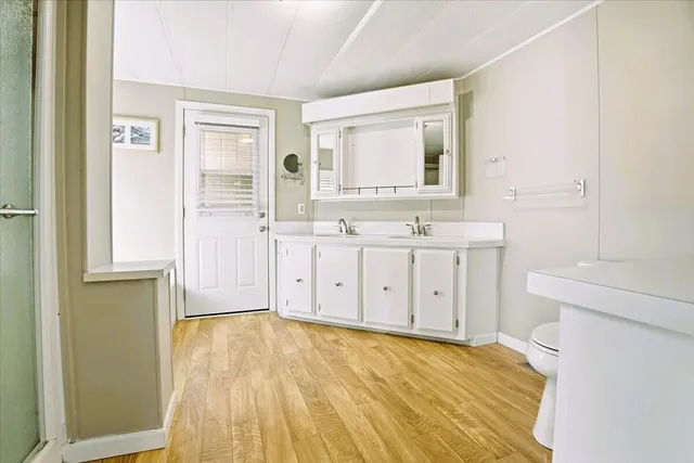 a view of bathroom with bathtub and shower