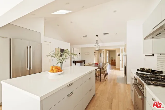 a view of a kitchen with breakfast area