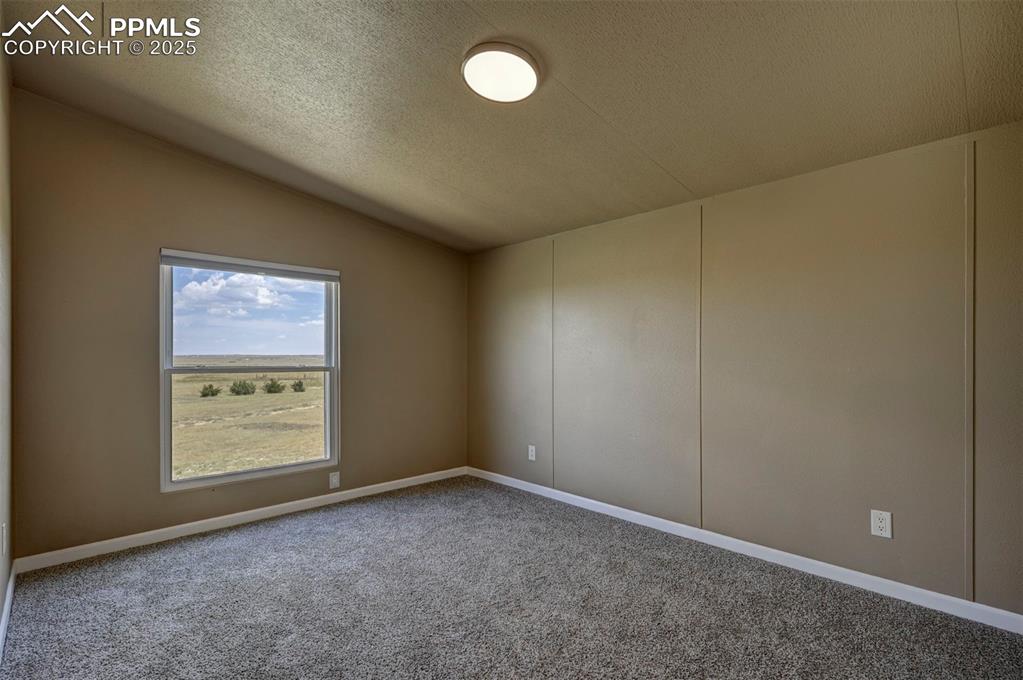 33115 Torrence Road Yoder, CO 80864 - Photo 18 of 50 an empty room with windows