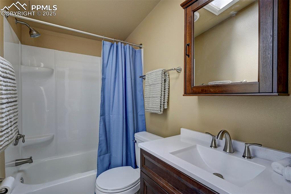 33115 Torrence Road Yoder, CO 80864 - Photo 20 of 50 a bathroom with a sink toilet and shower