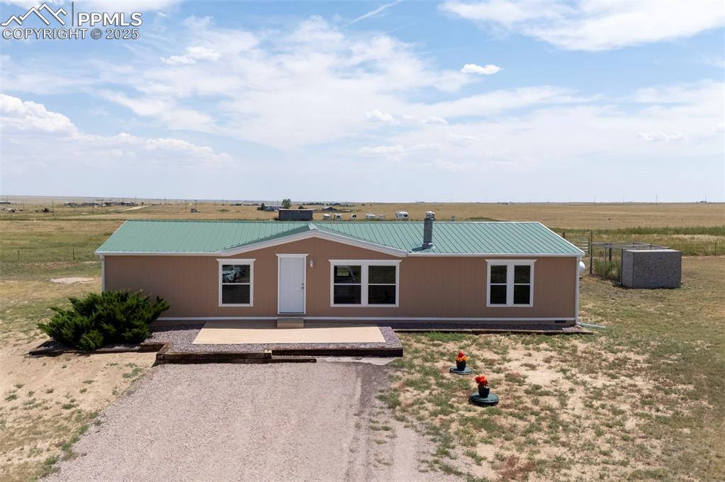 33115 Torrence Road Yoder, CO 80864 - Photo 37 of 50 an aerial view of a house with a yard