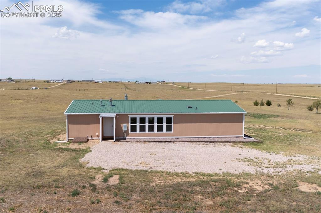 33115 Torrence Road Yoder, CO 80864 - Photo 39 of 50 a view of a lake with a big yard