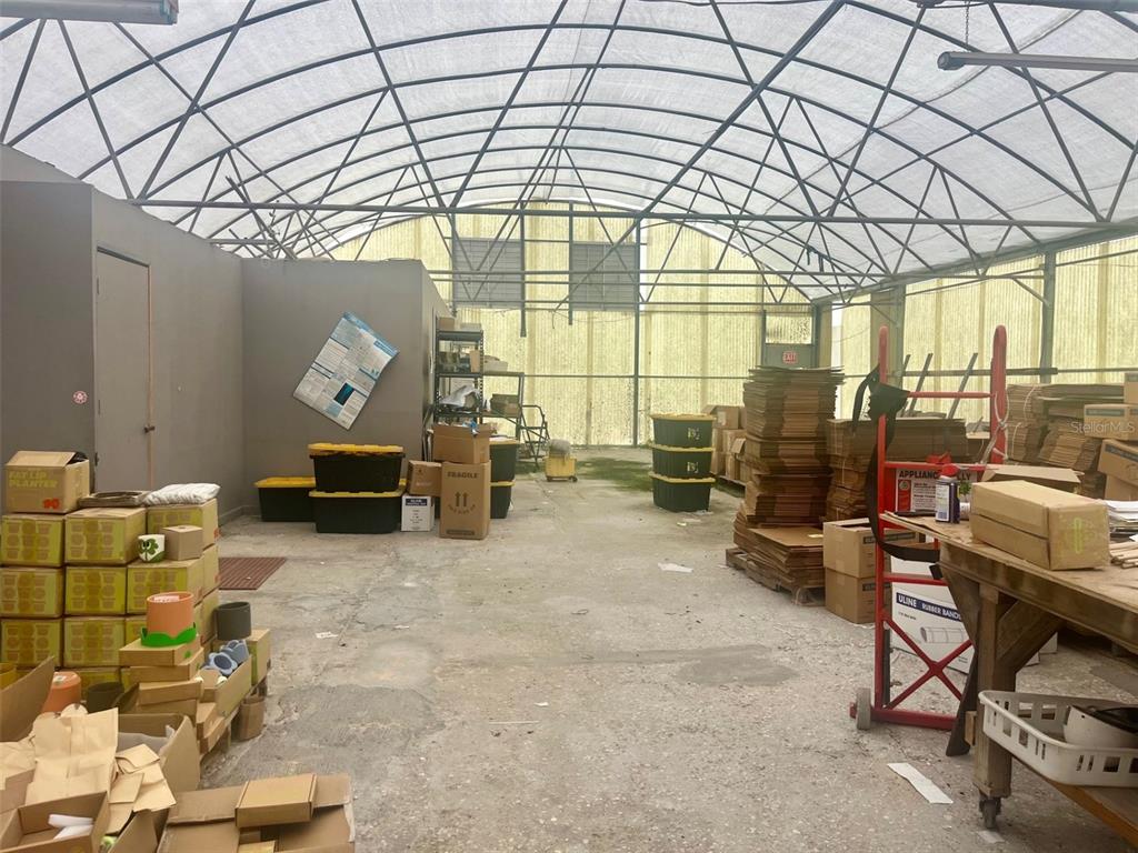 4103 Ondich Road Apopka, FL 32712 - Photo 7 of 13 a living room with lots of furniture and a chandelier