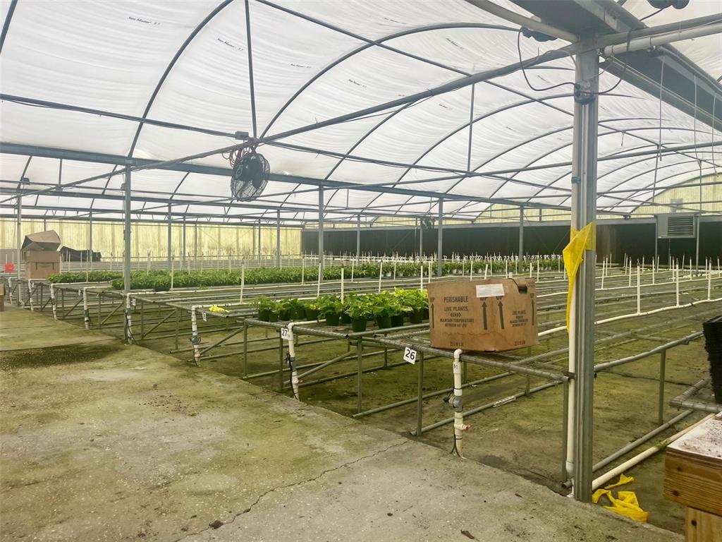 4103 Ondich Road Apopka, FL 32712 - Photo 9 of 13 a view of a room with wooden floor and outdoor seating