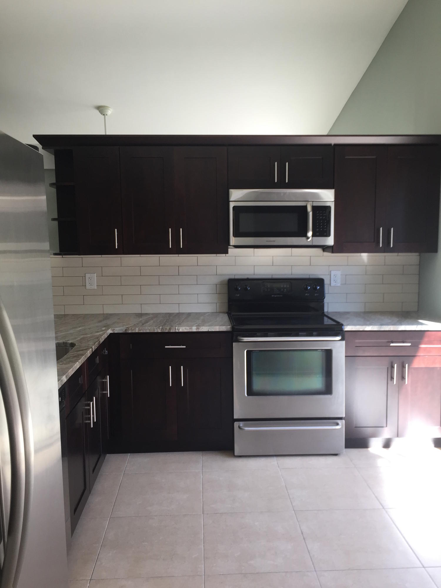 2115 Northwest 18th Street Delray Beach, FL 33445 - Photo 3 of 11 kitchen ne 18th st